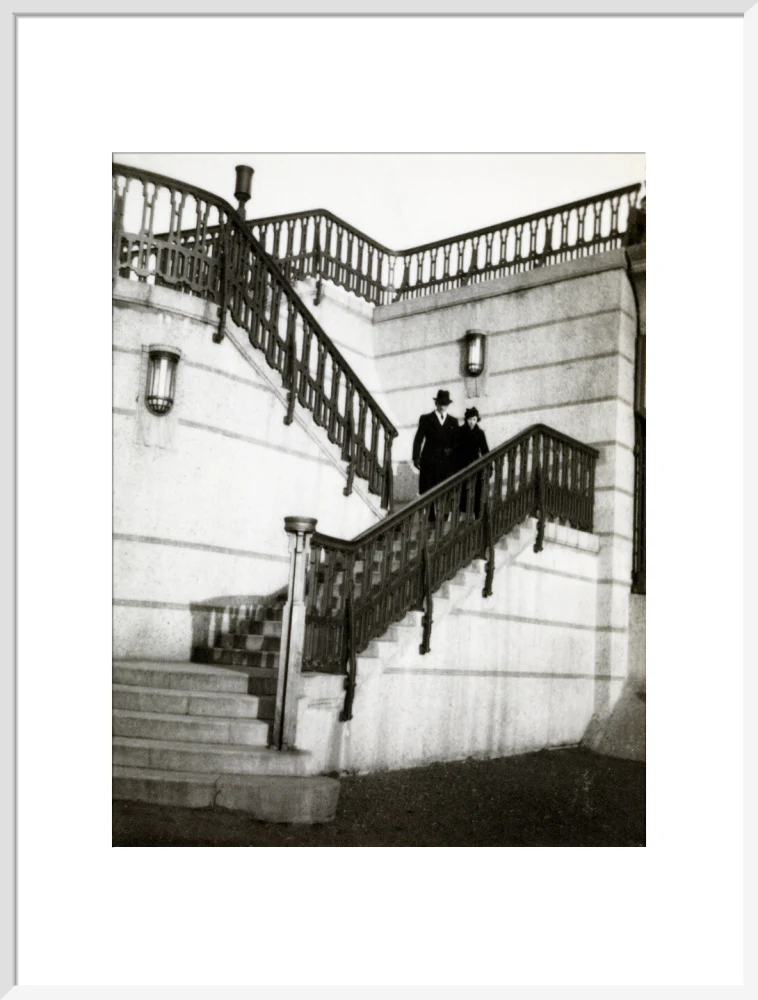 Couple walking down steps - Image 24