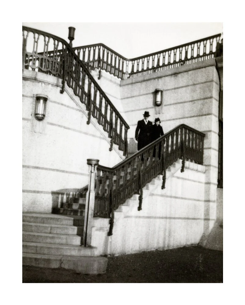 Couple walking down steps - Image 29