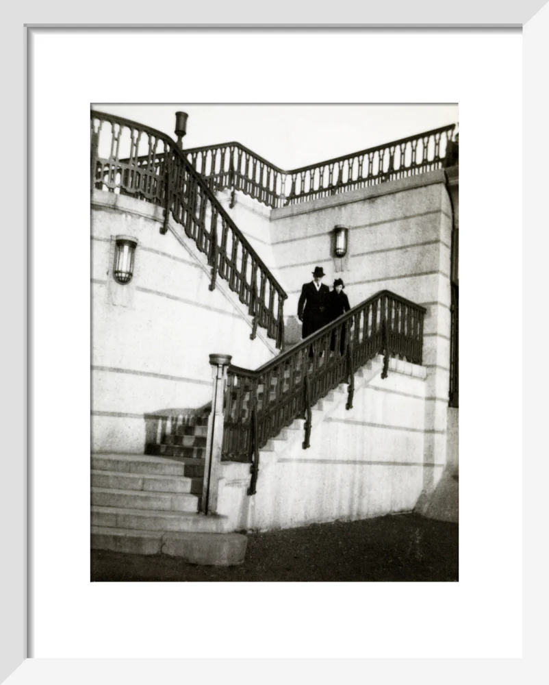 Couple walking down steps - Image 37