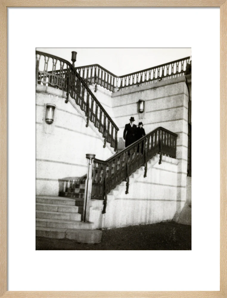 Couple walking down steps - Image 49