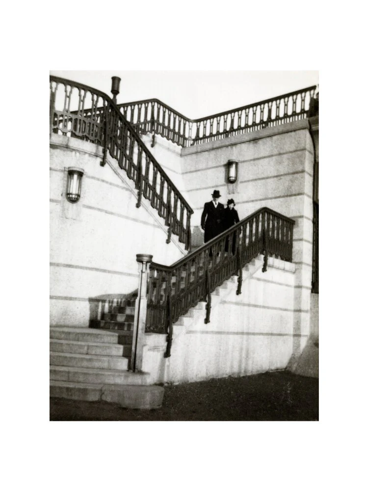 Couple walking down steps - Image 55