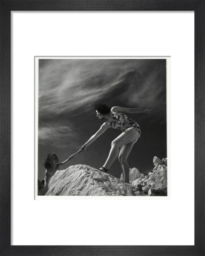 Woman helping child climb onto a rock, about 1935 - Image 3