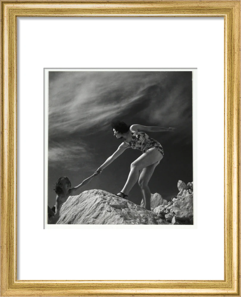 Woman helping child climb onto a rock, about 1935 - Image 38