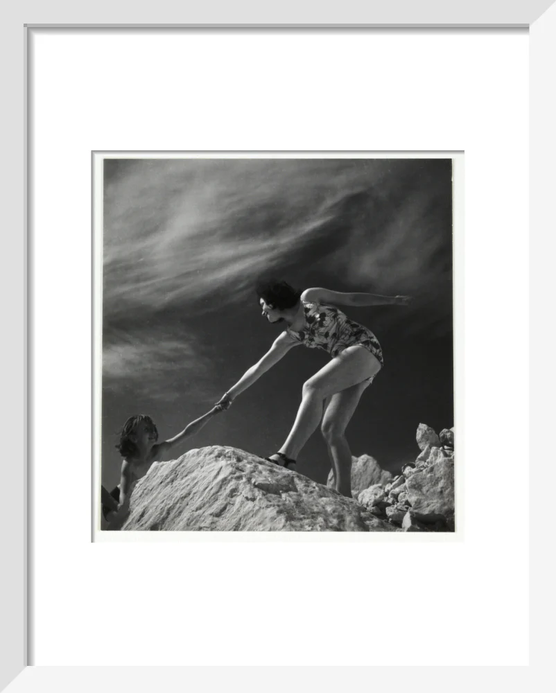 Woman helping child climb onto a rock, about 1935 - Image 4
