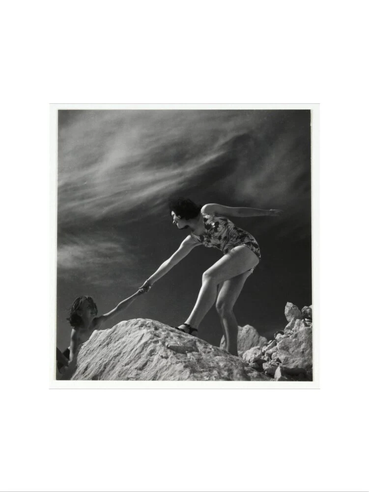 Woman helping child climb onto a rock, about 1935 - Image 7