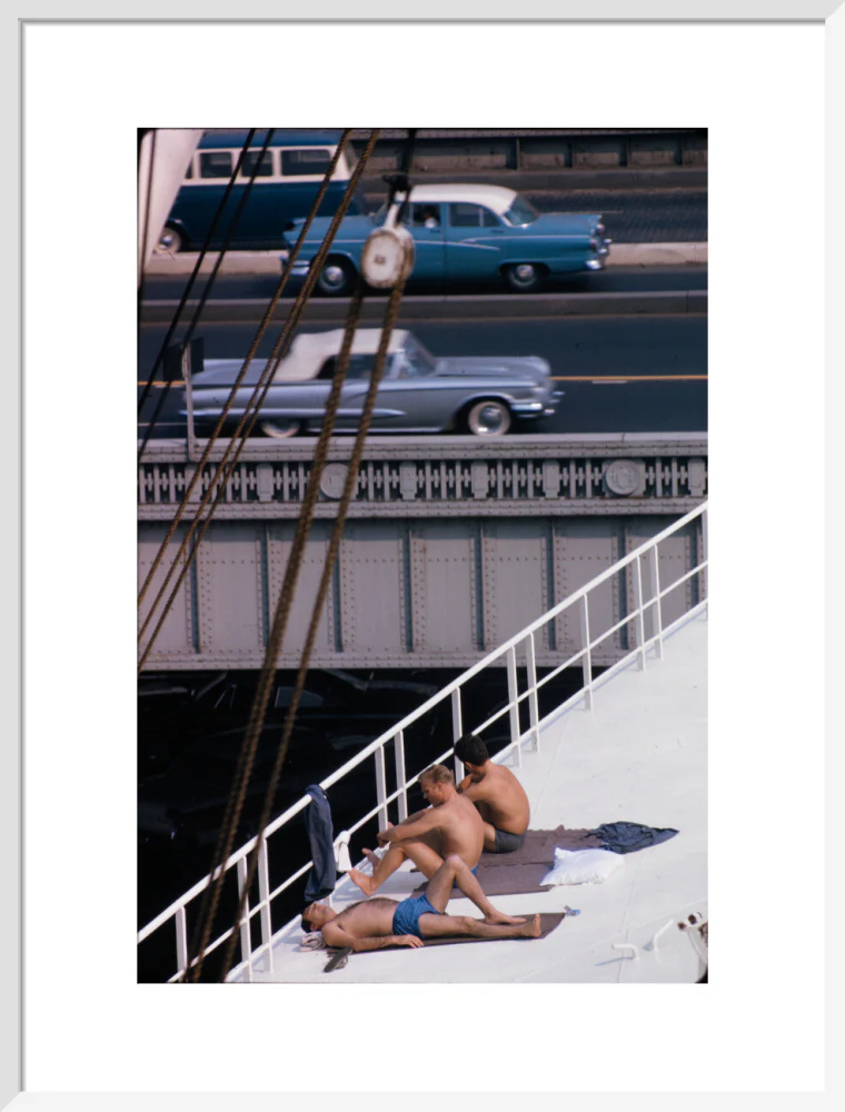 Sunbathers on a bridge, USA - Image 19