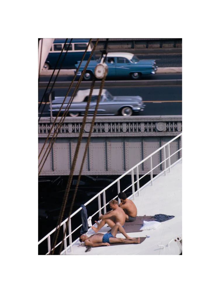 Sunbathers on a bridge, USA - Image 27