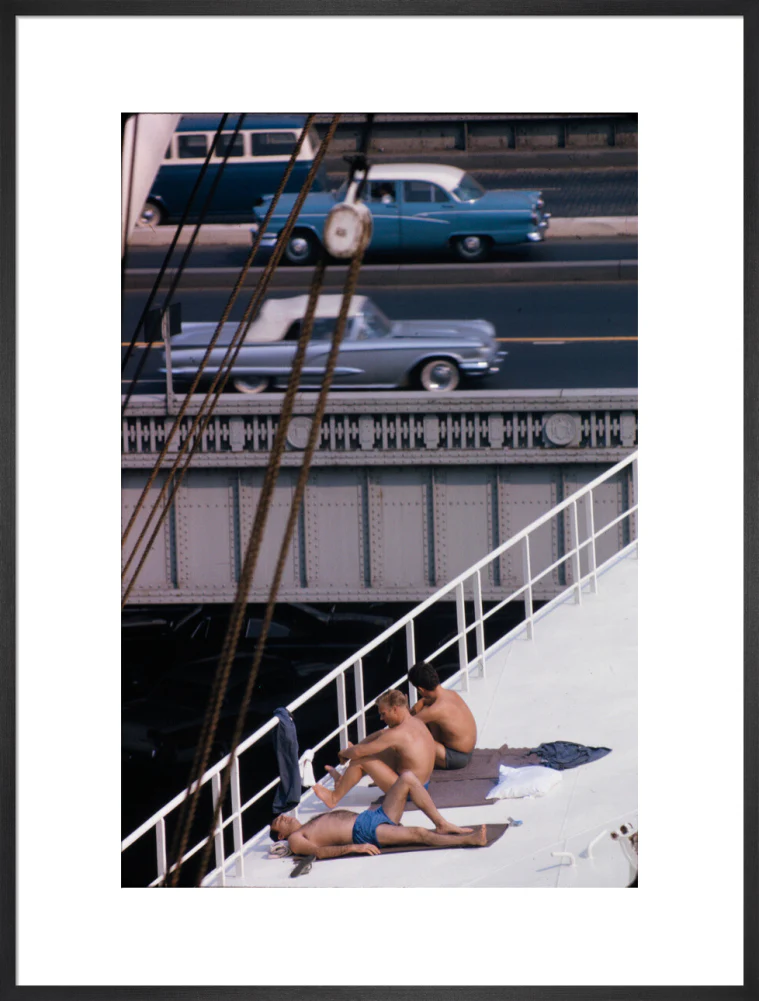 Sunbathers on a bridge, USA - Image 56