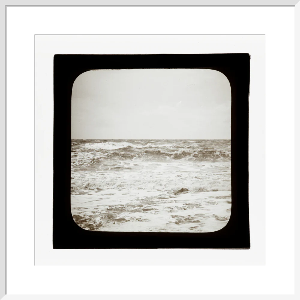 A magic lantern slide of sea waves crashing against the shore by Birt Acres, c. 1893. - Image 14