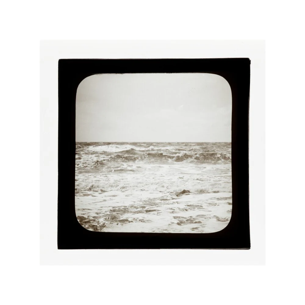 A magic lantern slide of sea waves crashing against the shore by Birt Acres, c. 1893. - Image 50