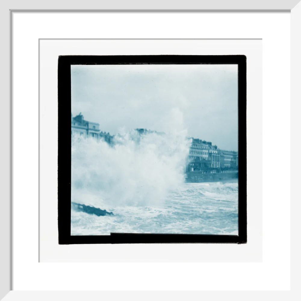 A magic lantern slide of sea waves crashing against the shore by Birt Acres, c. 1893. - Image 32