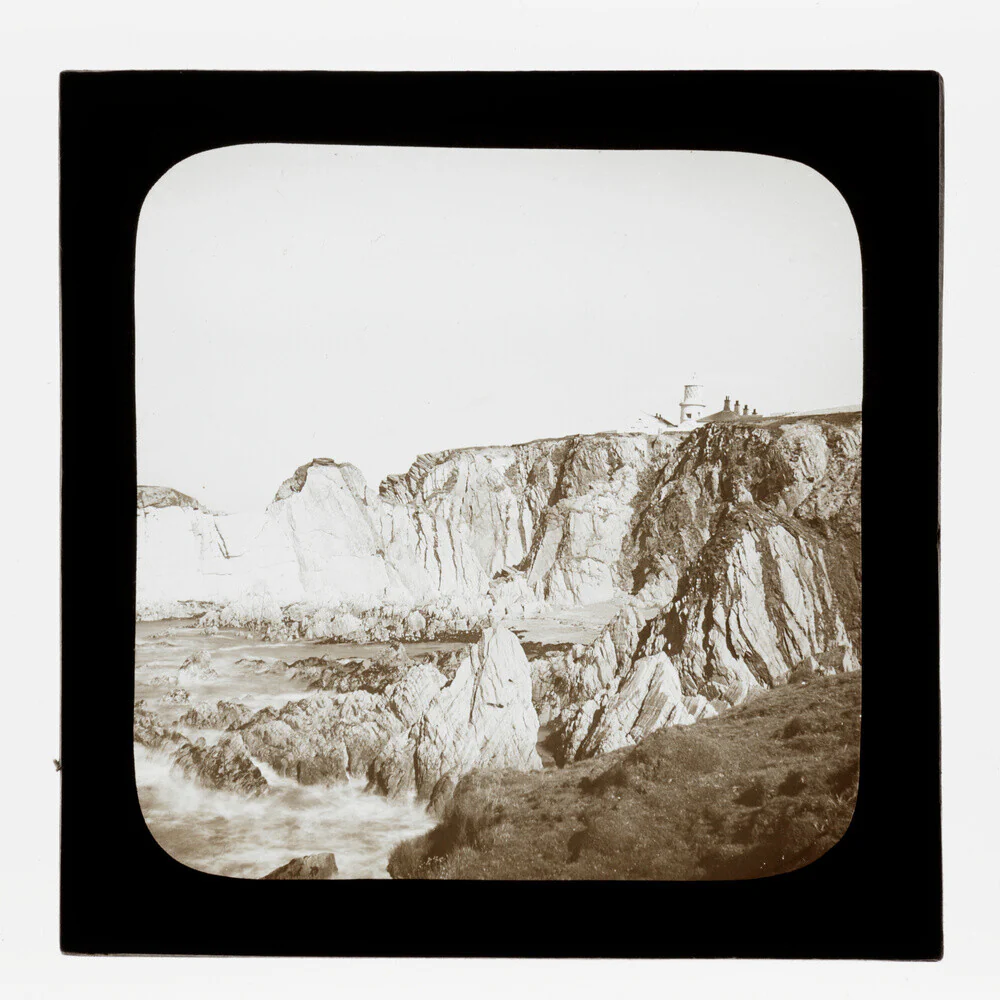 A magic lantern slide of Bull Point by Birt Acres, c. 1893.