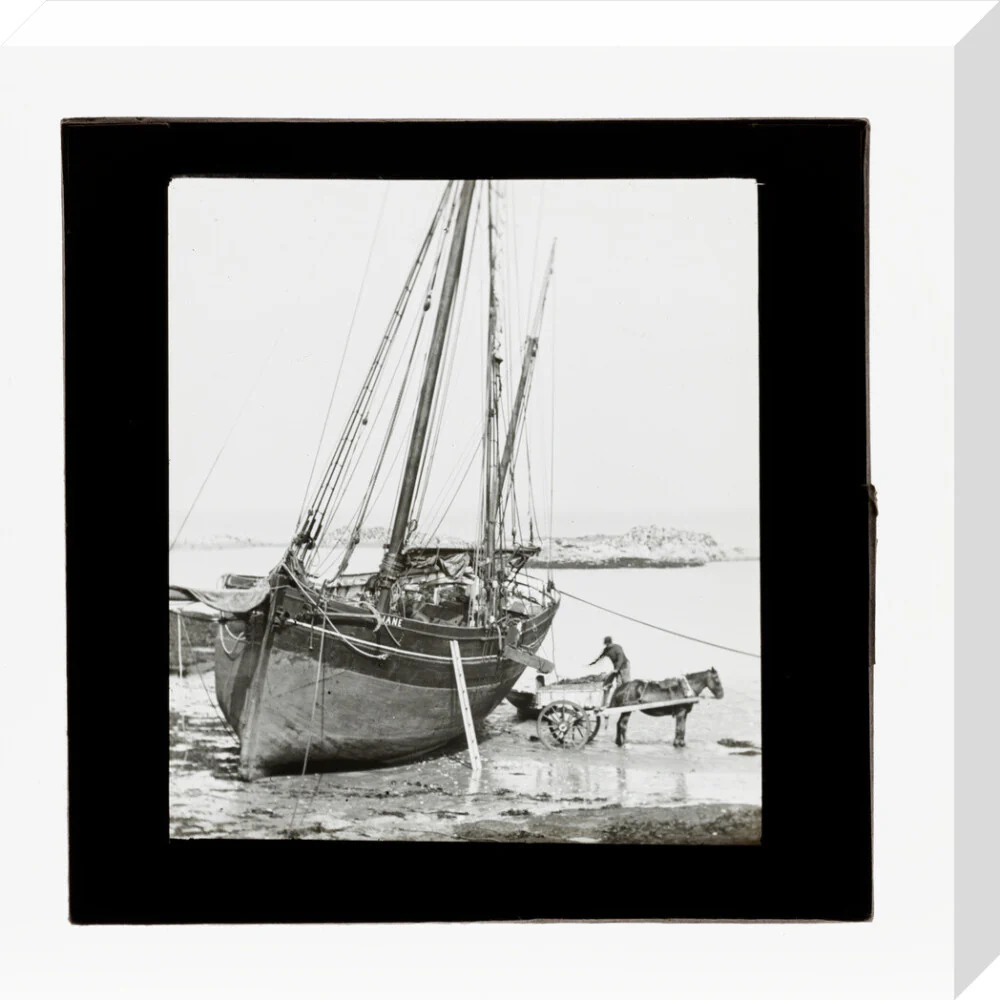 A magic lantern slide of a boat in harbour by Birt Acres, c. 1893. - Image 32