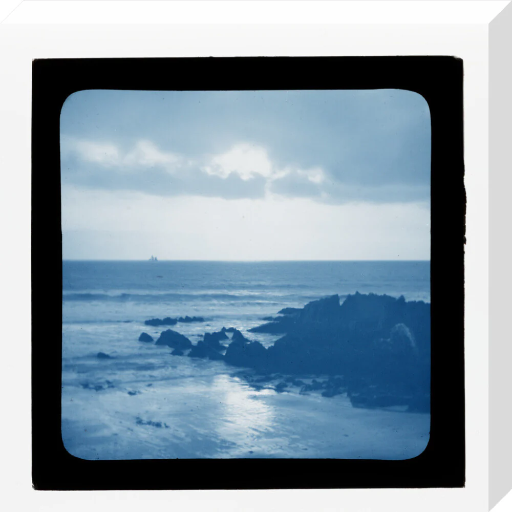 A magic lantern slide showing a seascape with rocks by Birt Acres, c. 1893. (Blue carbon for projection). - Image 32