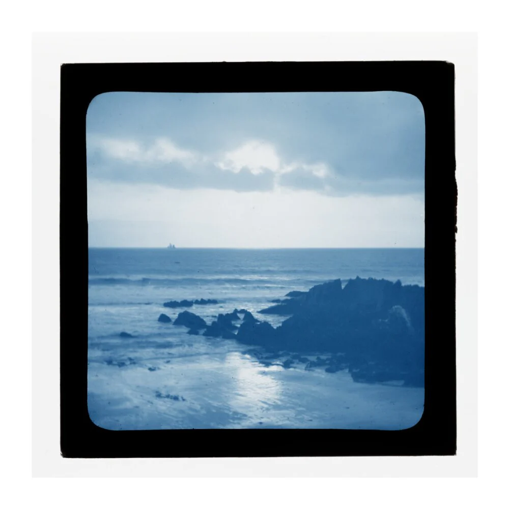 A magic lantern slide showing a seascape with rocks by Birt Acres, c. 1893. (Blue carbon for projection). - Image 63