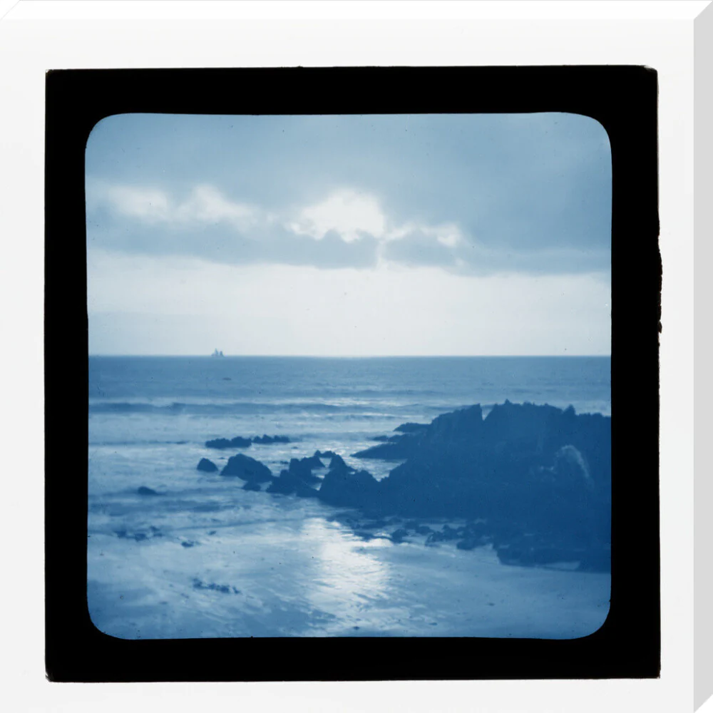A magic lantern slide showing a seascape with rocks by Birt Acres, c. 1893. (Blue carbon for projection). - Image 67