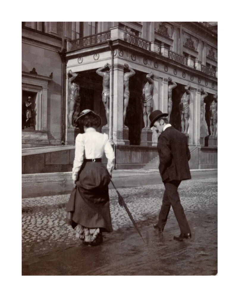 Man and woman crossing the road circa 1900 - Image 62