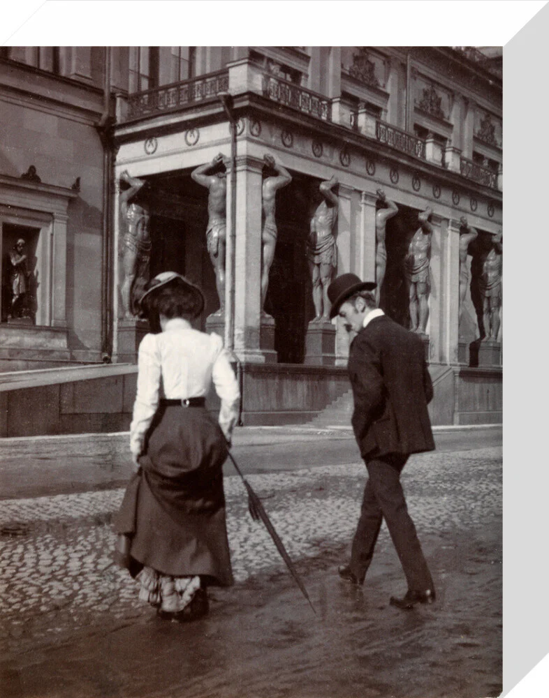 Man and woman crossing the road circa 1900 - Image 64