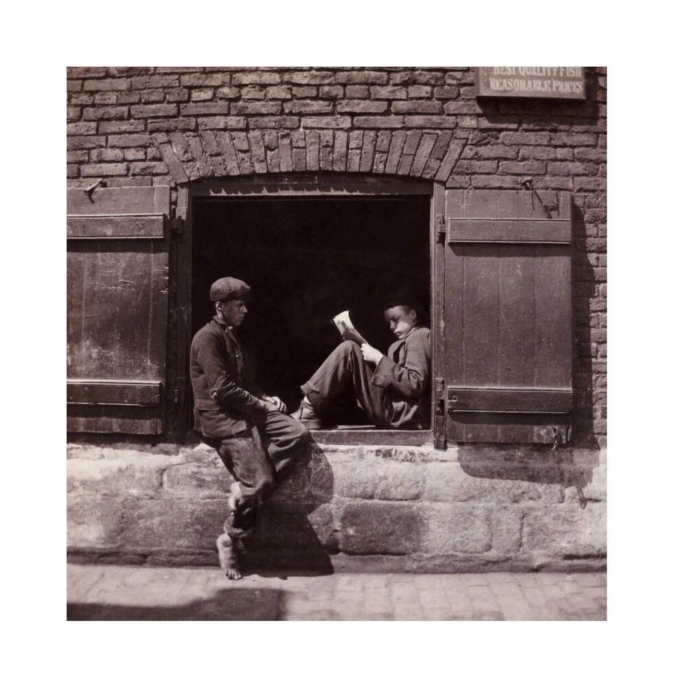 Two boys sitting on a window ledge, c 1905. - Image 61