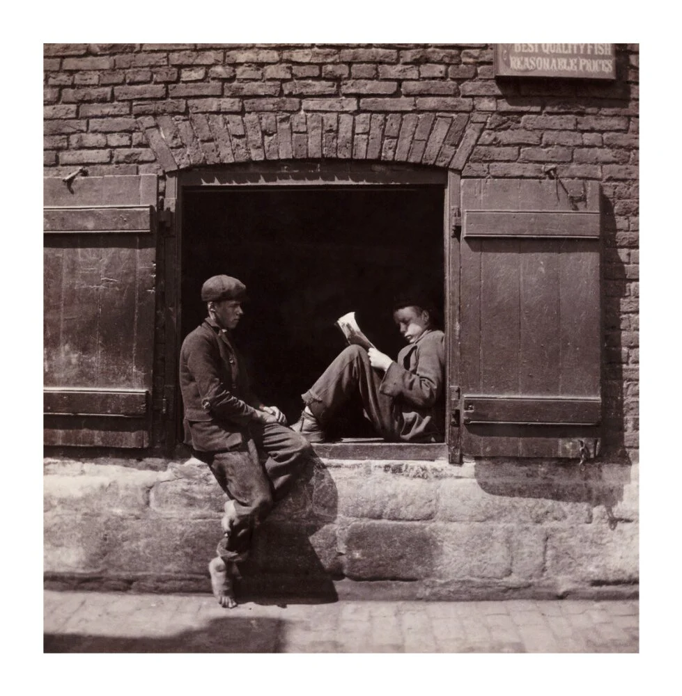 Two boys sitting on a window ledge, c 1905. - Image 63