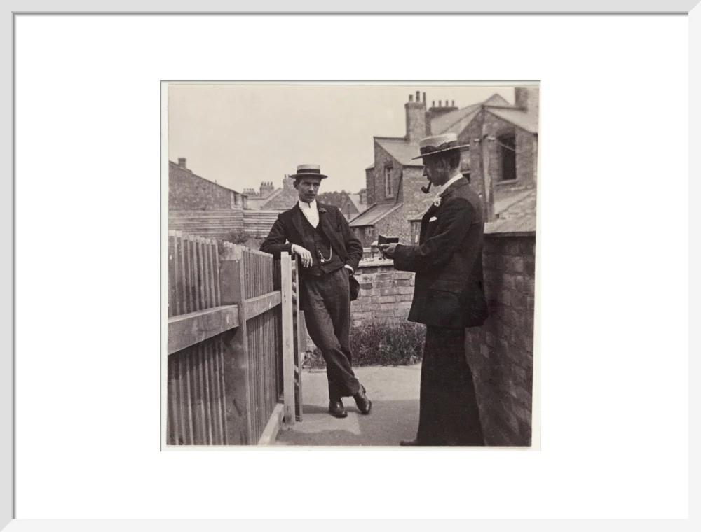Man taking a photograph with a Brownie camera, c 1900. - Image 19