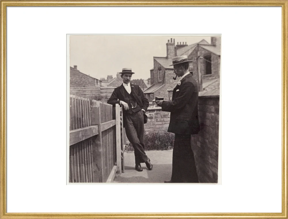 Man taking a photograph with a Brownie camera, c 1900. - Image 25