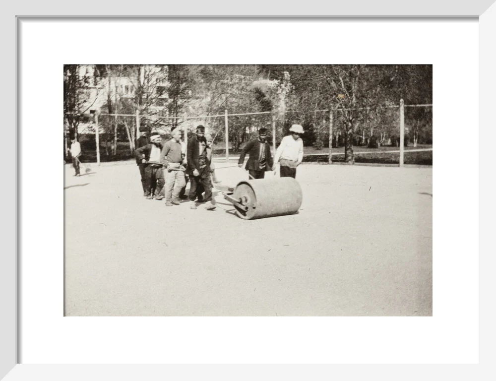 Rolling the Tennis Courts. - Image 42