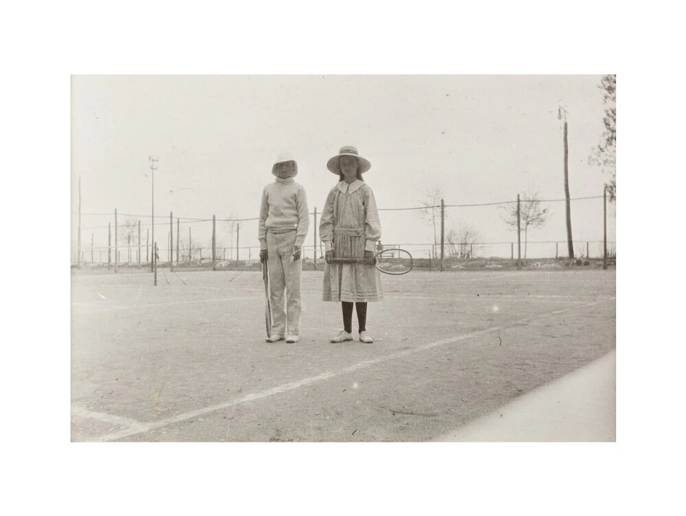 H. H. Prince Nikita Alexandrovitch and Atia Staroselsky on the tennis court, both are holding rackets. - Image 17