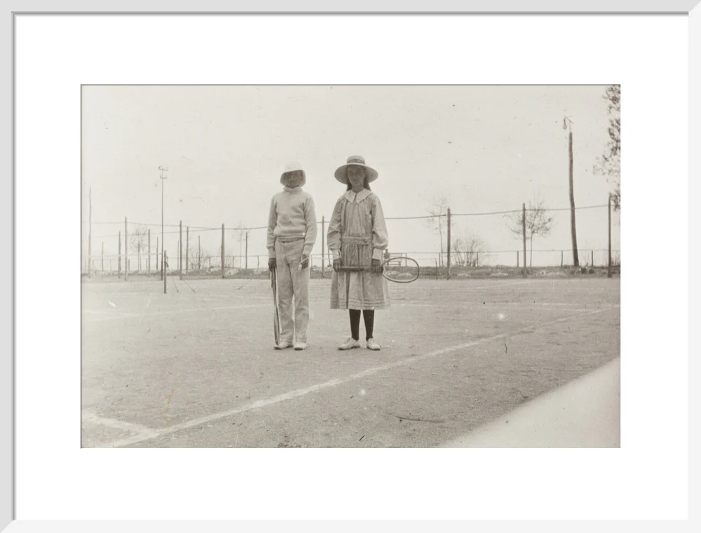 H. H. Prince Nikita Alexandrovitch and Atia Staroselsky on the tennis court, both are holding rackets. - Image 52