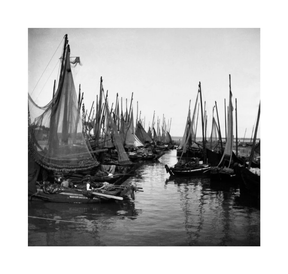 Small fishing boats moored in a harbour, c. 1910. - Image 23
