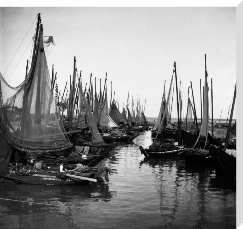 Small fishing boats moored in a harbour, c. 1910. - Image 29