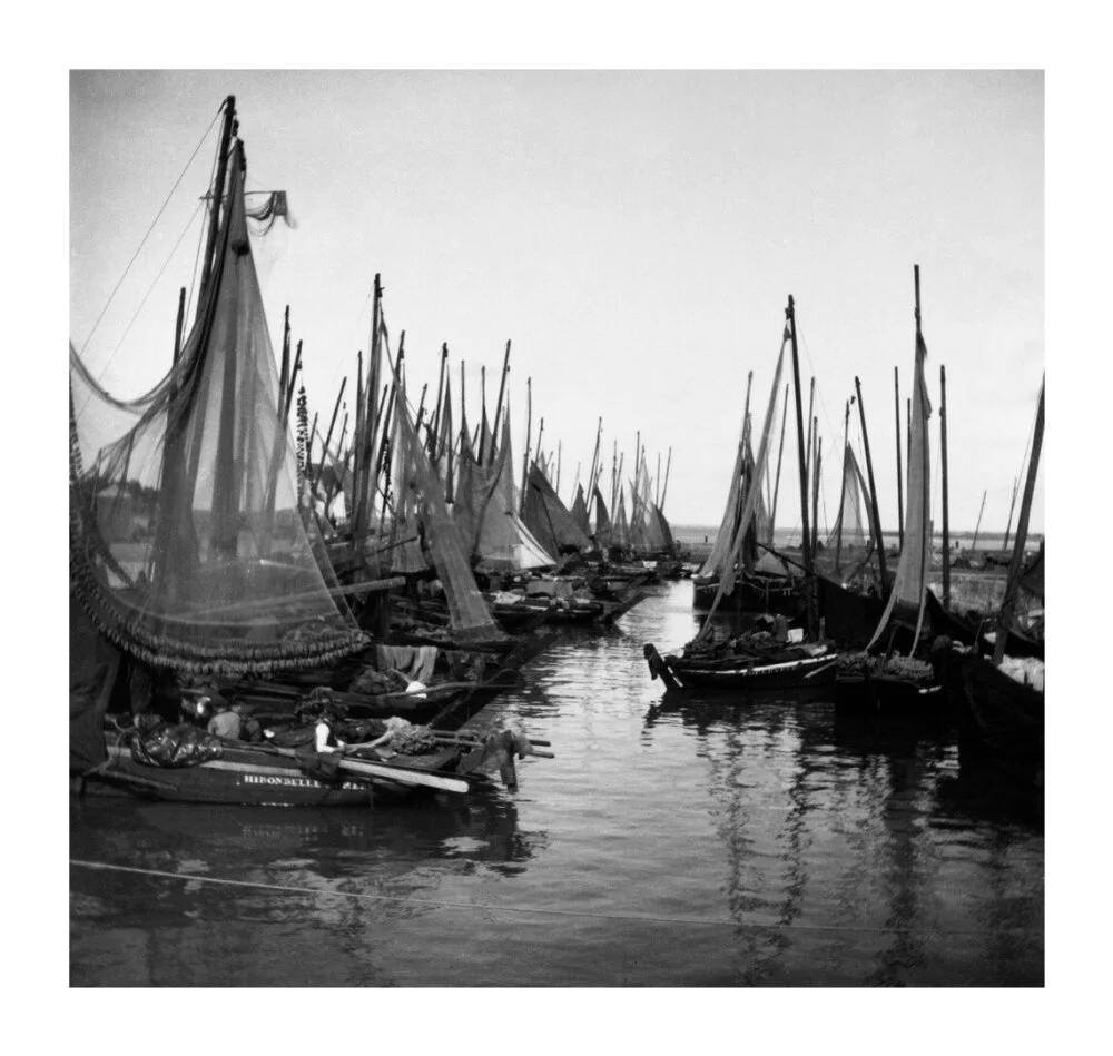 Small fishing boats moored in a harbour, c. 1910. - Image 53