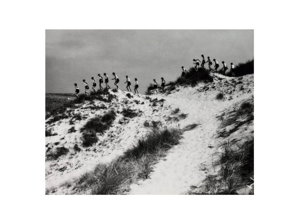Horizon line of women walking over dunes, about 1930. - Image 22