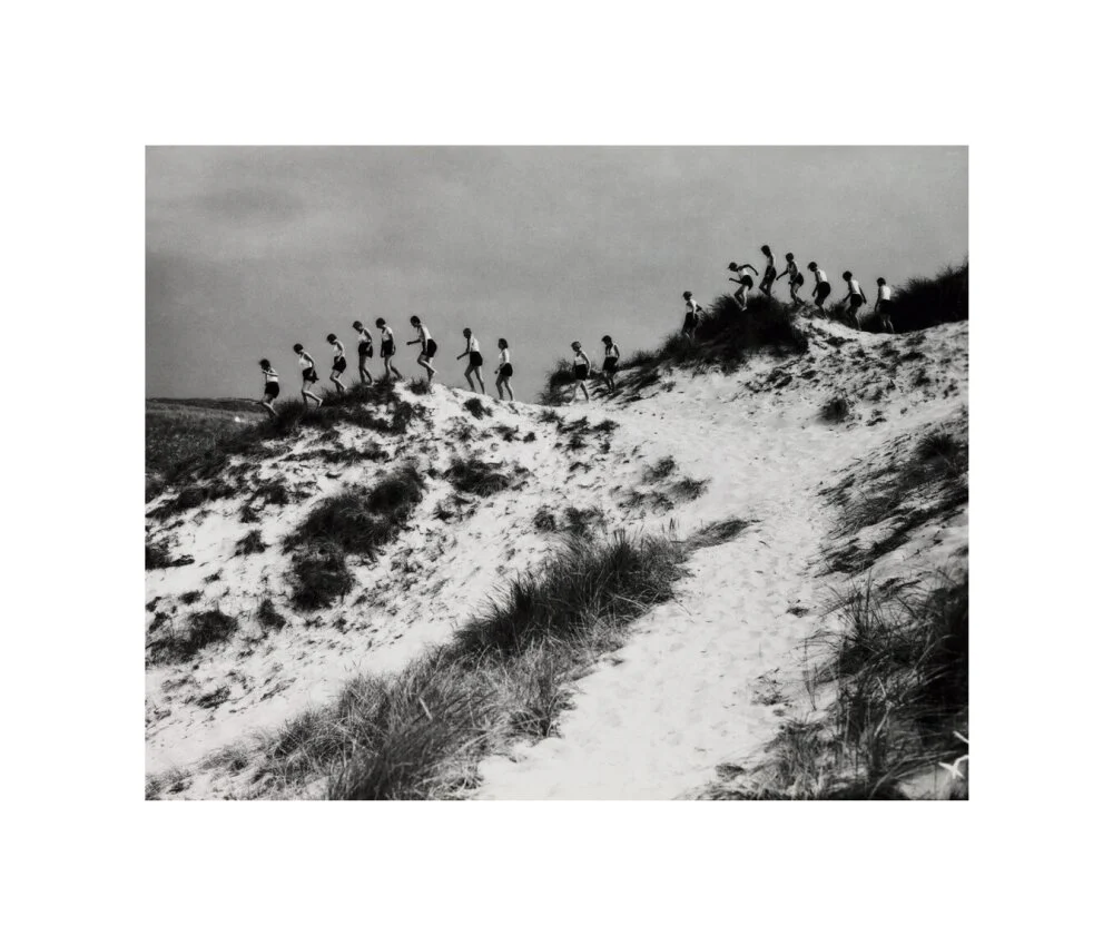 Horizon line of women walking over dunes, about 1930. - Image 27