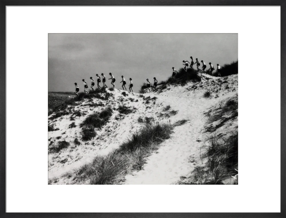 Horizon line of women walking over dunes, about 1930. - Image 51
